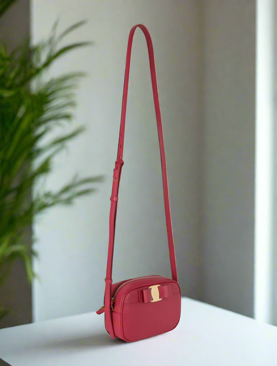 Pink Ferragamo Vara Bow Camera Crossbody Bag with Gold Hardware