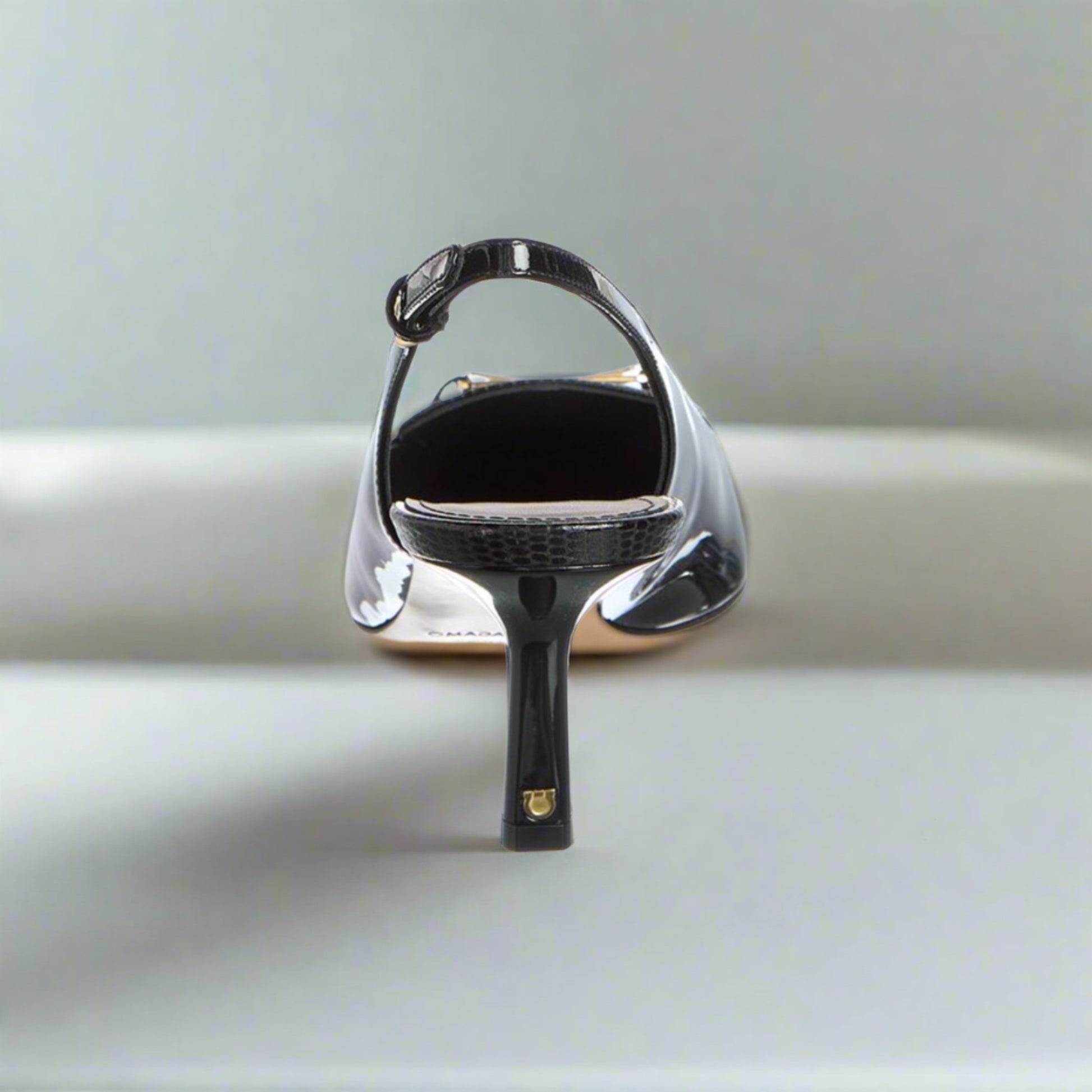 Salvatore Ferragamo Black Patent Slingback Pump with Gold Hardware