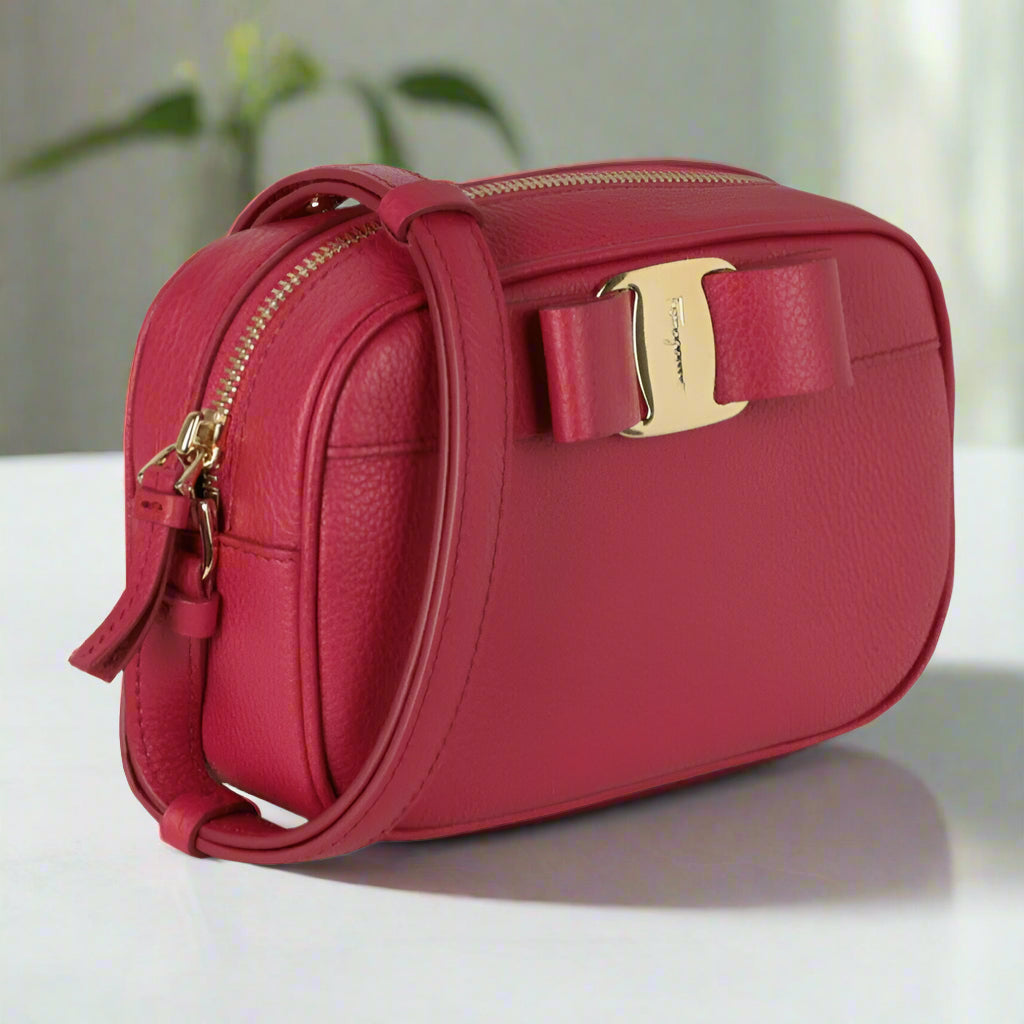 Pink Ferragamo Vara Bow Camera Crossbody Bag with Gold Hardware