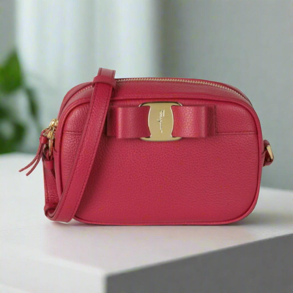Pink Ferragamo Vara Bow Camera Crossbody Bag with Gold Hardware