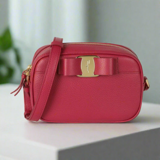 Pink Ferragamo Vara Bow Camera Crossbody Bag with Gold Hardware